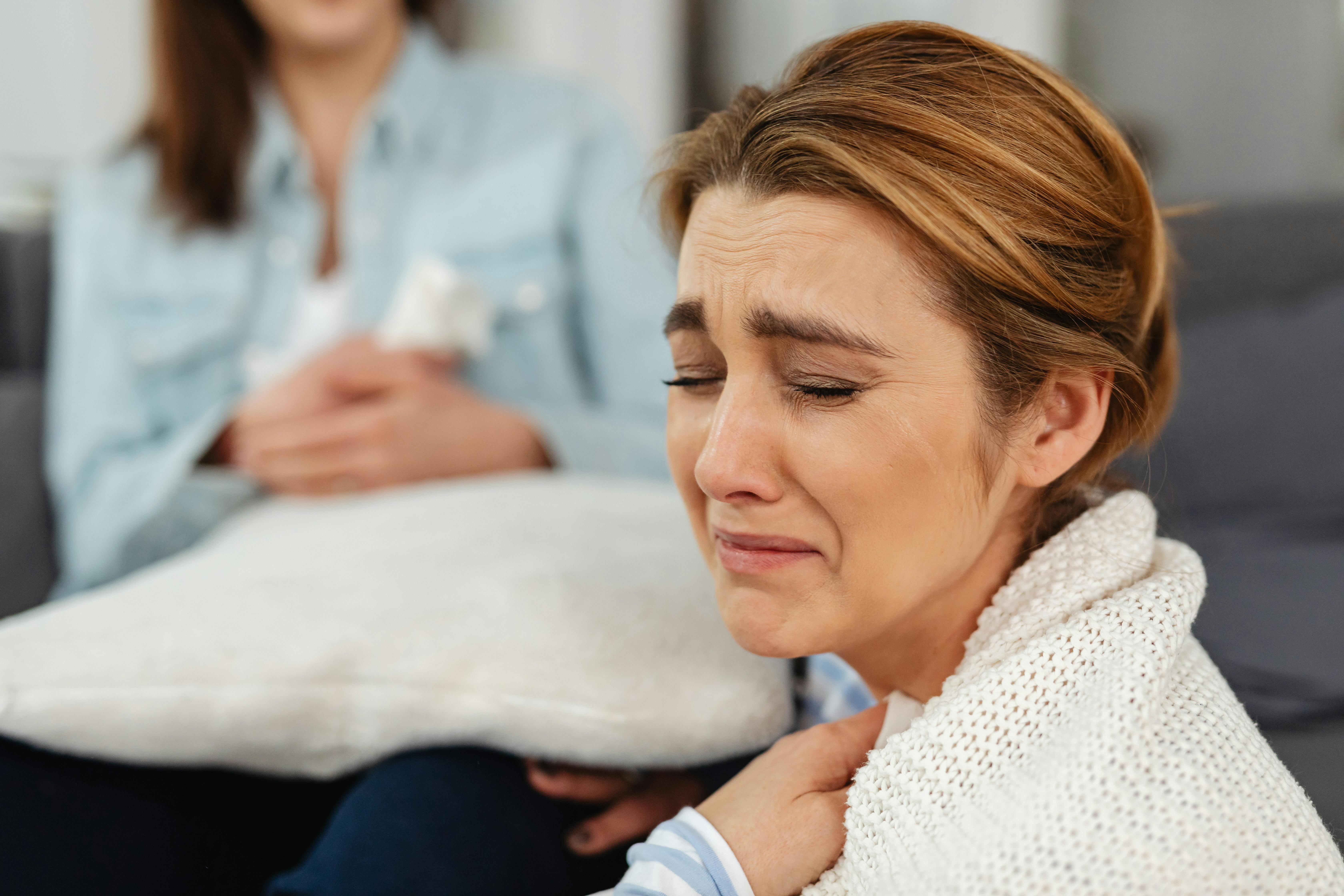 Therapist helping with mood swings and emotional balance through hypnotherapy