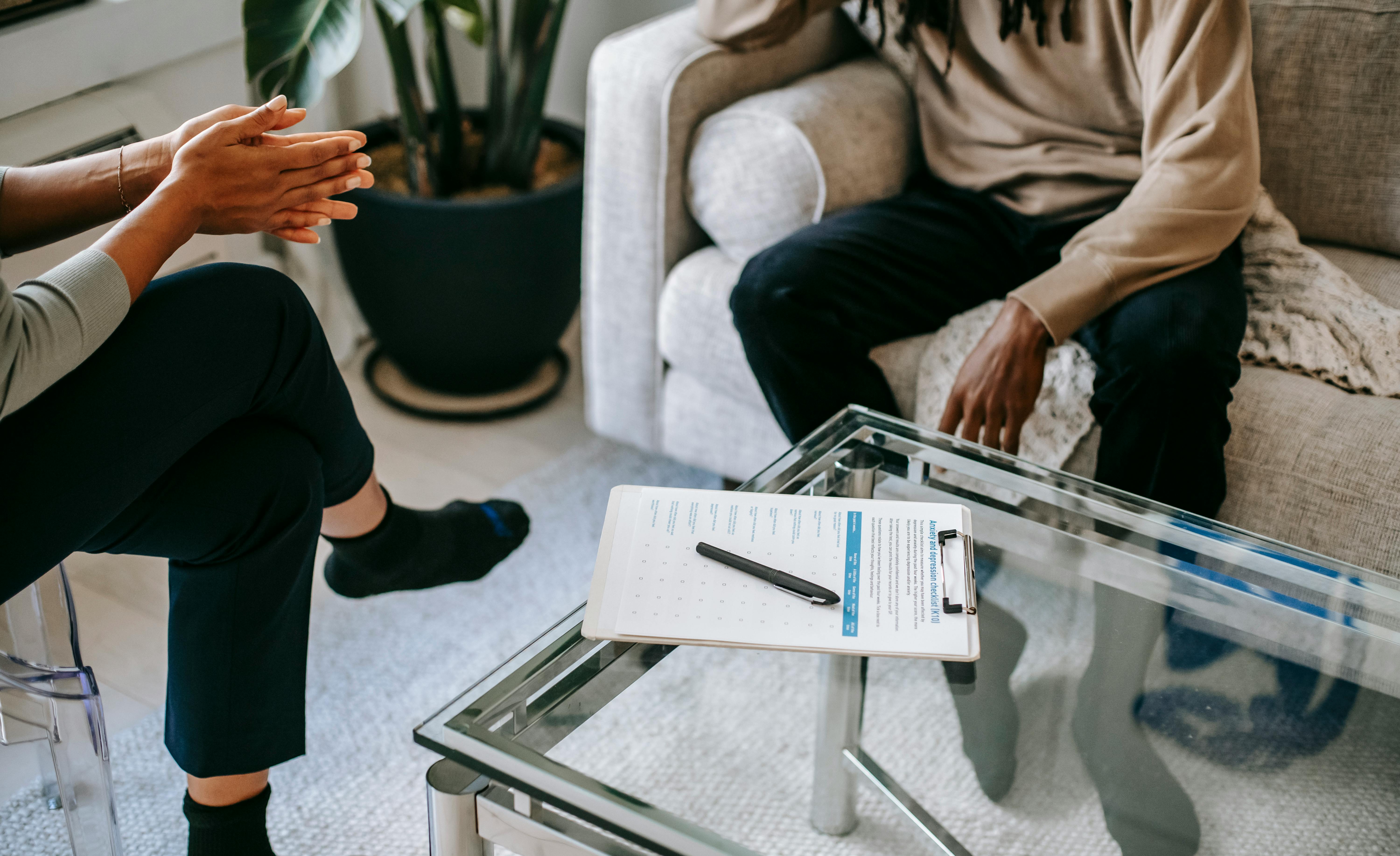 Individual struggling with anxiety and overthinking seeking therapeutic support